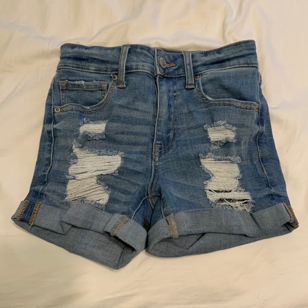 Girls ripped Jean shorts